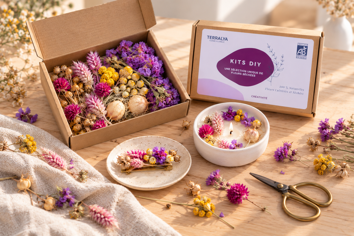 Kit DIY Terralya de têtes de fleurs séchées bio avec bougie et création florale sur une table de loisirs créatifs